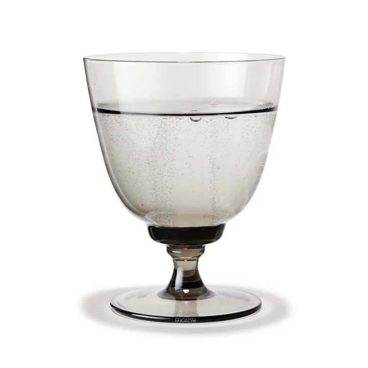 Flow Drinking glass with base with Holmegaard in the color smoke
