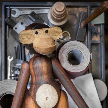 The Kay Bojesen Ape has different tones and grains in the wood