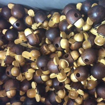 The Kay Bojesen Ape: A dark teak wood head