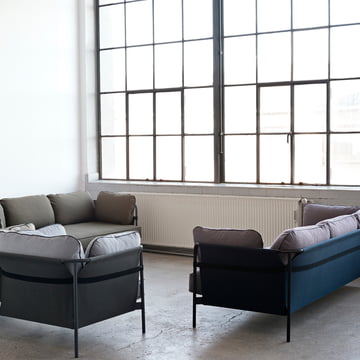 Can sofa, 3-seater and armchair group arranged by Hay to form a seating area