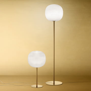 The Gem floor and table lamps, white / gold by Foscarini in their different versions