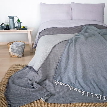 The Cocoon blanket from Collection sets accents on the bed