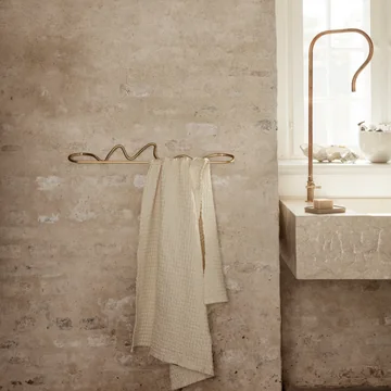 Curvature towel rail and Organic bath towel from Ferm Living