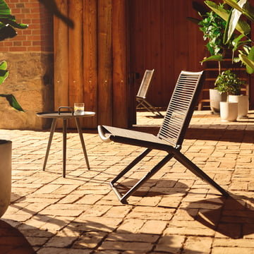 Neo garden chair in dark gray finish and the Ella side table from Collection