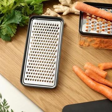 Grate-It grater with container from Rig-Tig by Stelton in color black