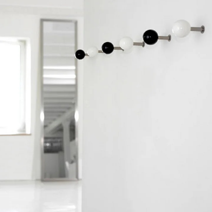 The Schönbuch Dots wall hooks on the wall