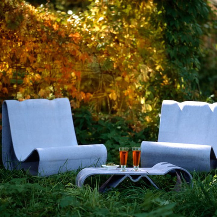 The Willy Guhl Loop outdoor chair and table from Eternit in the autumn garden