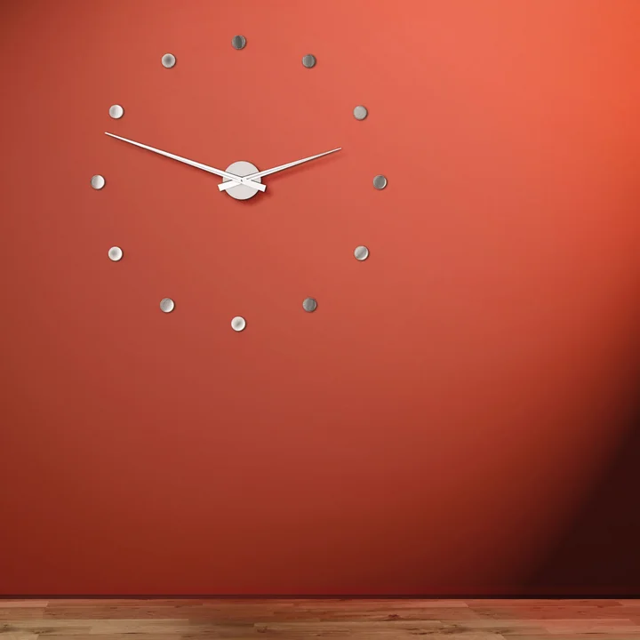 The Flexible wall clock on a red background