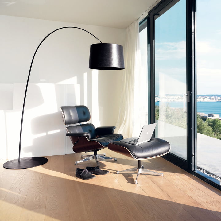 Twiggy arc lamp from Foscarini with Lounge Chair & Ottoman from Vitra