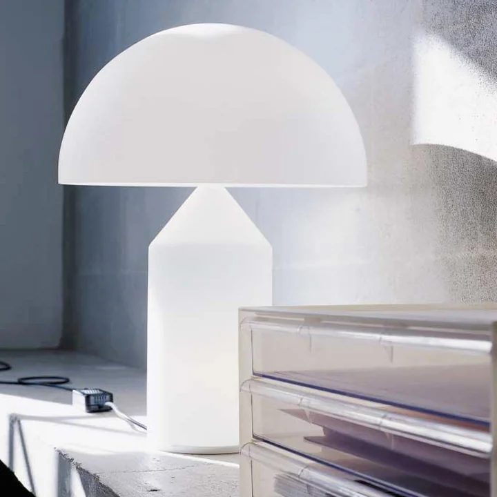 Atollo Table lamp on the sideboard