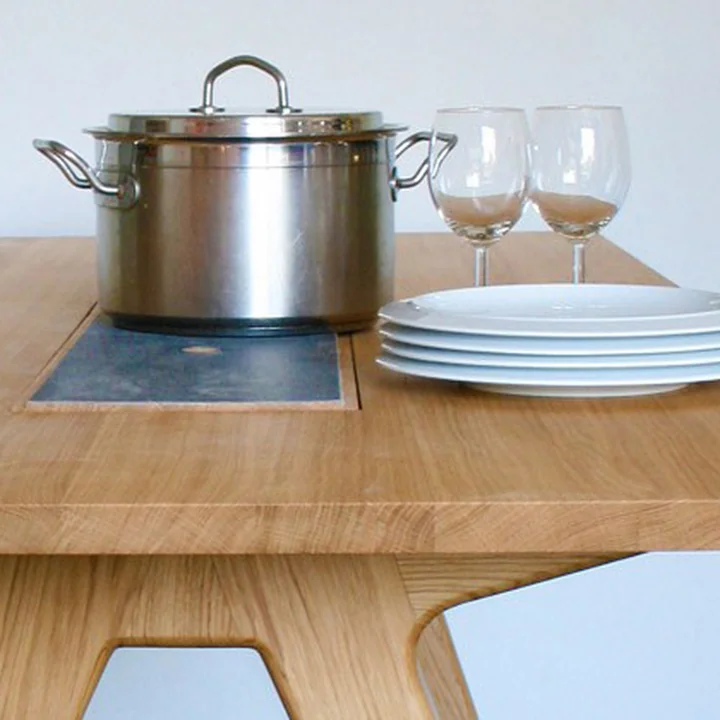 Slate plates as trivets at the Remix Collection Dining Table by The Hansen Family