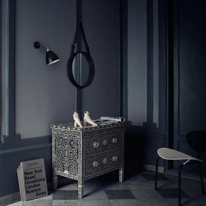 Adnet Mirror from Gubi in the hallway above the dresser