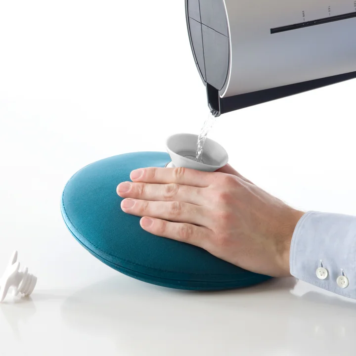 Pill Hot water bottle from Authentics during filling