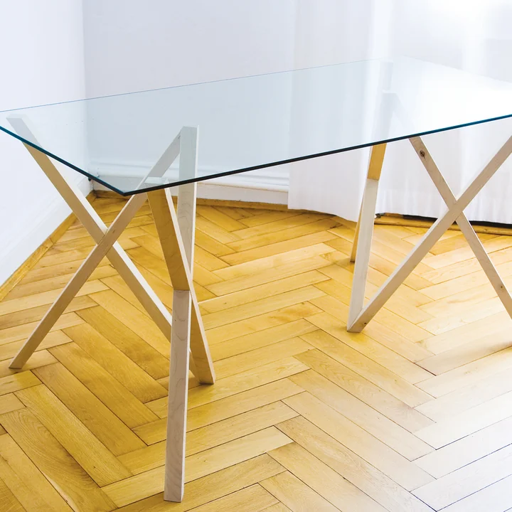 The Mika table trestle by Hans Hansen offers enough space on the sides