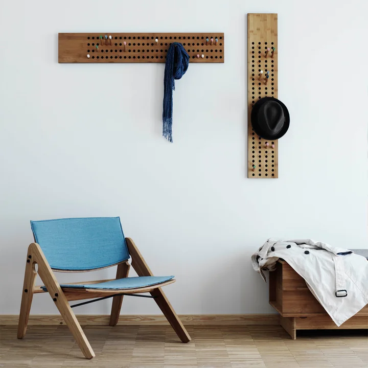 Comfort and design with the We do wood Scoreboard Wardrobe, the Complete Lounge Chair and the Correlations Bench.