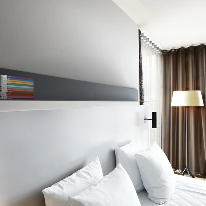 The Unu shelving system from Frost in the bedroom