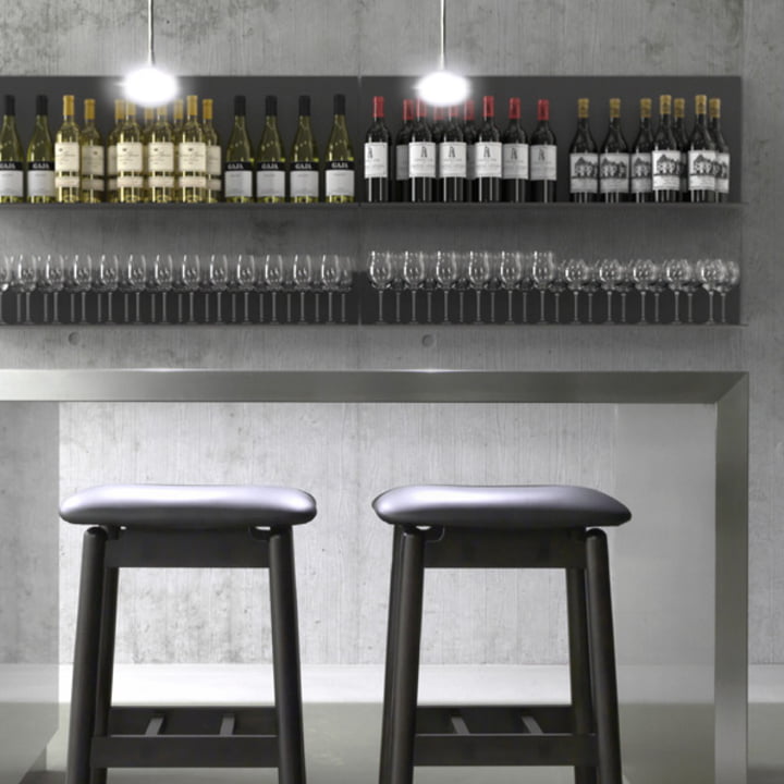 The Unu shelving system from Frost as a wine rack in the bar