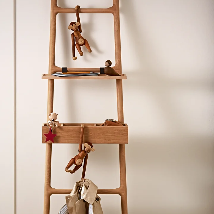 Wooden monkey, the bear and the lovebirds by Kay Bojesen on a ladder