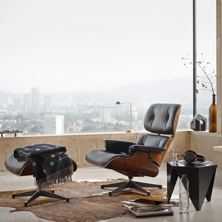 Lounge Chair & Ottoman from Vitra with the Prismatic Table