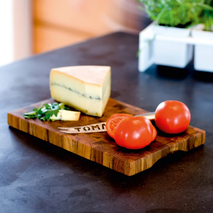 Skagerak teak cutting board with tomatoes and cheese slices