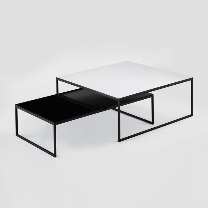 The Less H 5/2 VA coffee table from Hans Hansen with sled base in white and black