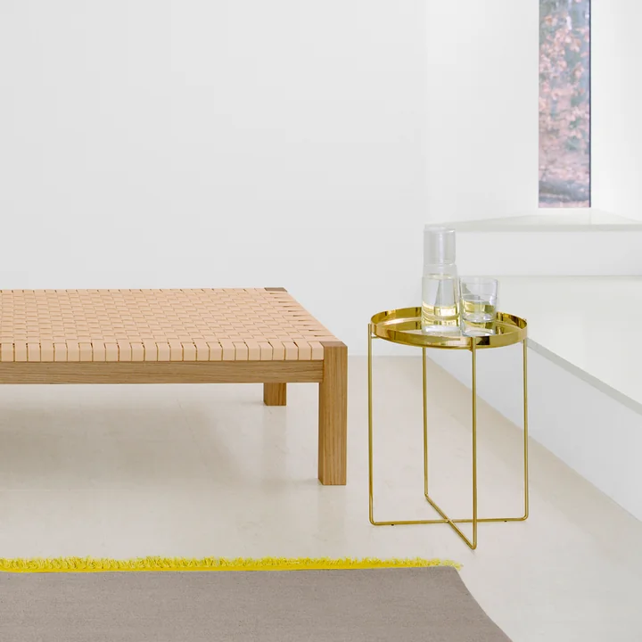 The CM05 Habibi side table in brass from e15