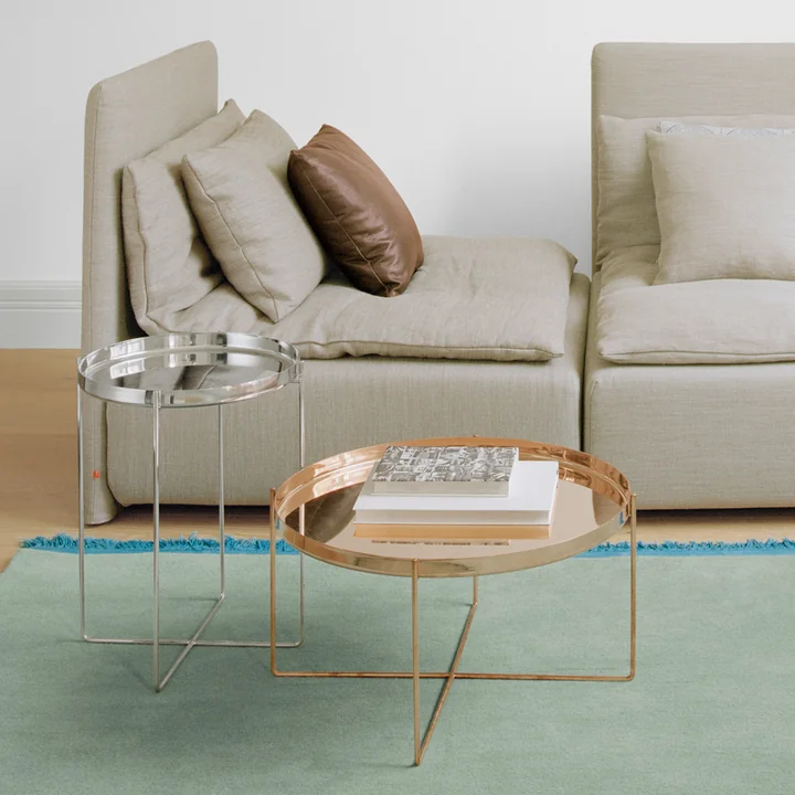 The CM05 Habibi side table in copper and silver from e15