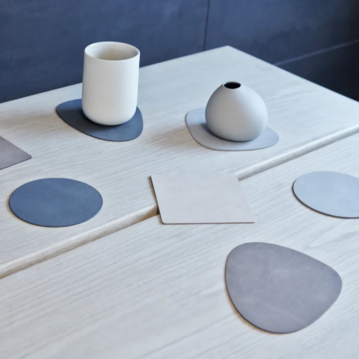 Glass coasters from Lind DNA