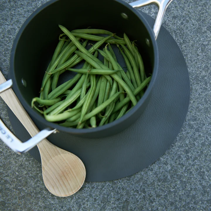 Heat-resistant leather trivet