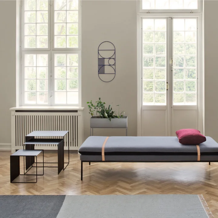 Kelim Rug Section by Ferm Living with the Outline wall decoration and the Cluster Tables