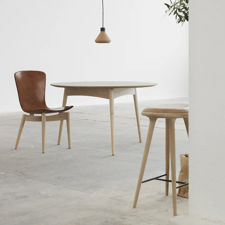 The Bar stool by Mater made from soaped oak with the Luiz Pendant Lamp made of cork
