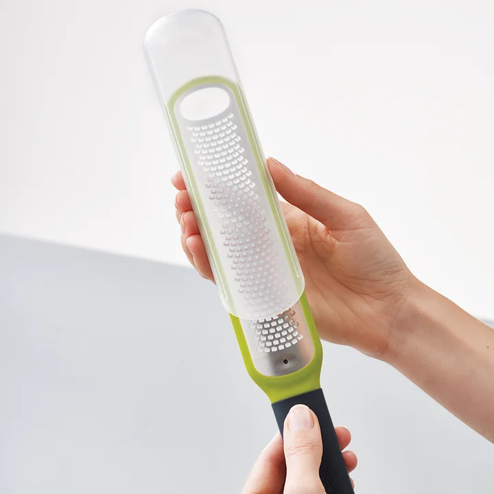 Handi-zest mini grater with protective blade guard