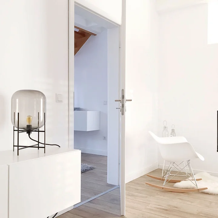 Oda lamp small of Pulpo and Eames Plastic Armchair RAR of Vitra