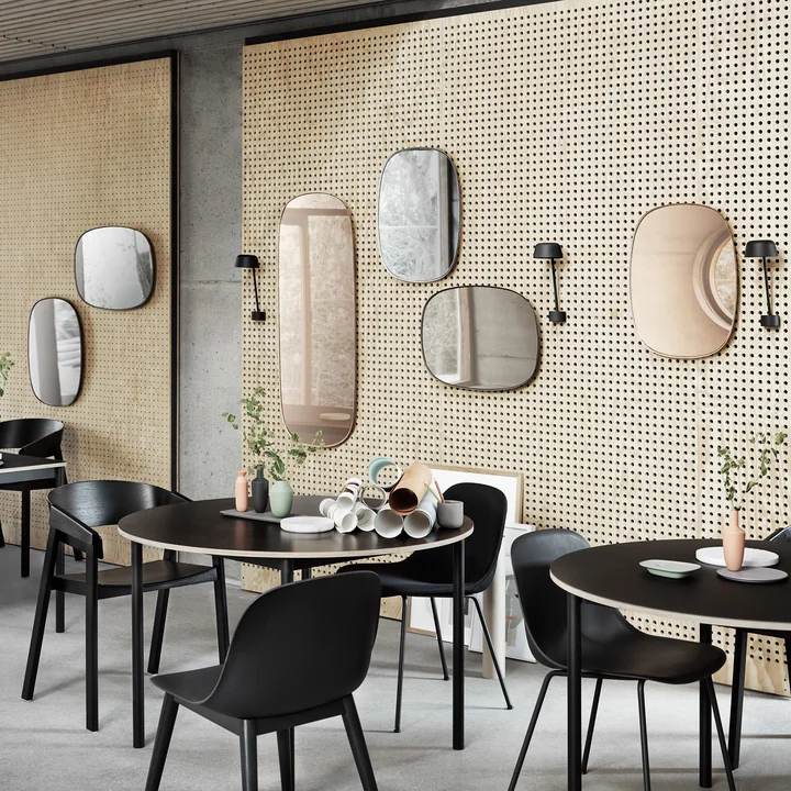 The Framed Mirror of Muuto in large and small with the Lean wall lamp