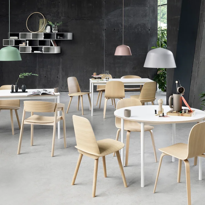 The Ambit pendant lamp, the Nerd chair, the Cover chair, the Visu chair and the Base table by Muuto