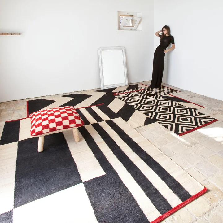 Mélange rugs and pouf by nanimarquina