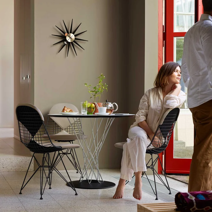 The Wire Chair DKR-2 Bikini and the Isamu Noguchi dining table by Vitra