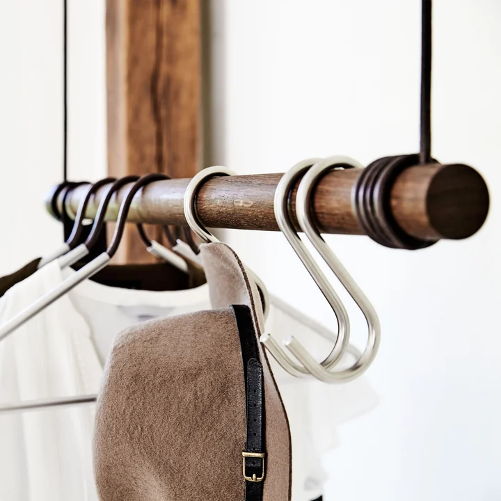Oblique view of a hanging coat rack with the coat hook by Lind DNA