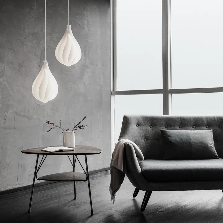 Lampshades by Umage at different heights.