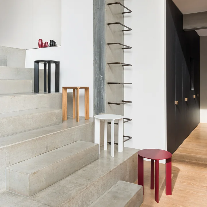 Image of different varieties of the Hans stool & side table by Schönbuch.