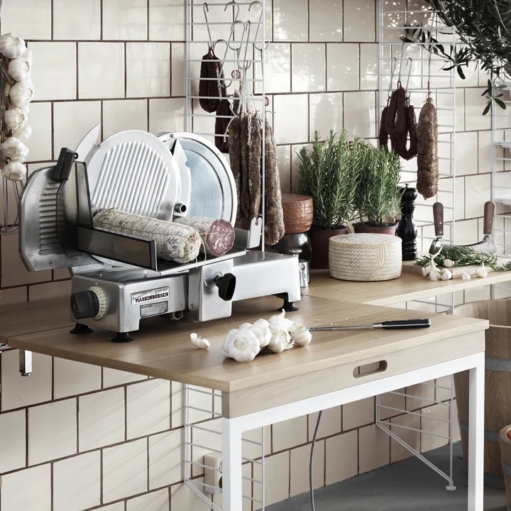 Folding table from String in oak / white