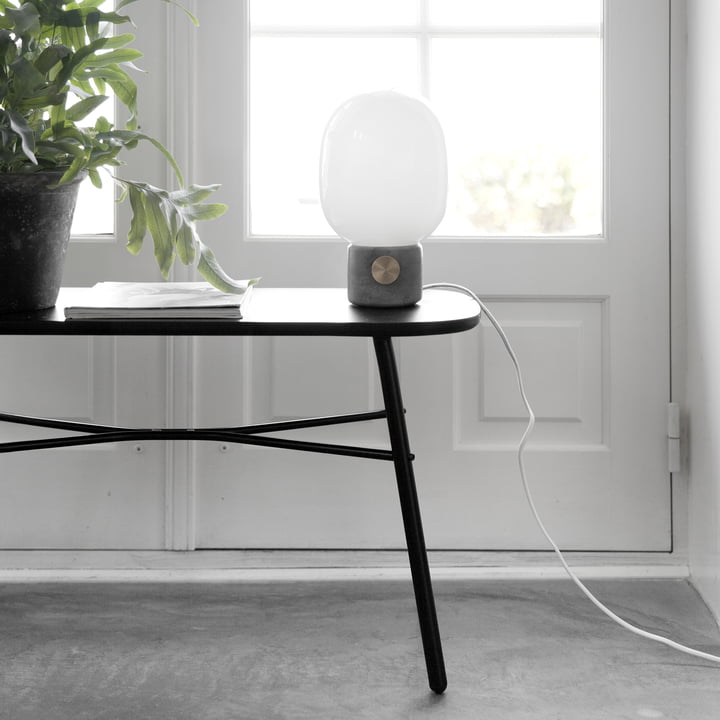 The Menu Bench Decorated with a Lamp and Plant
