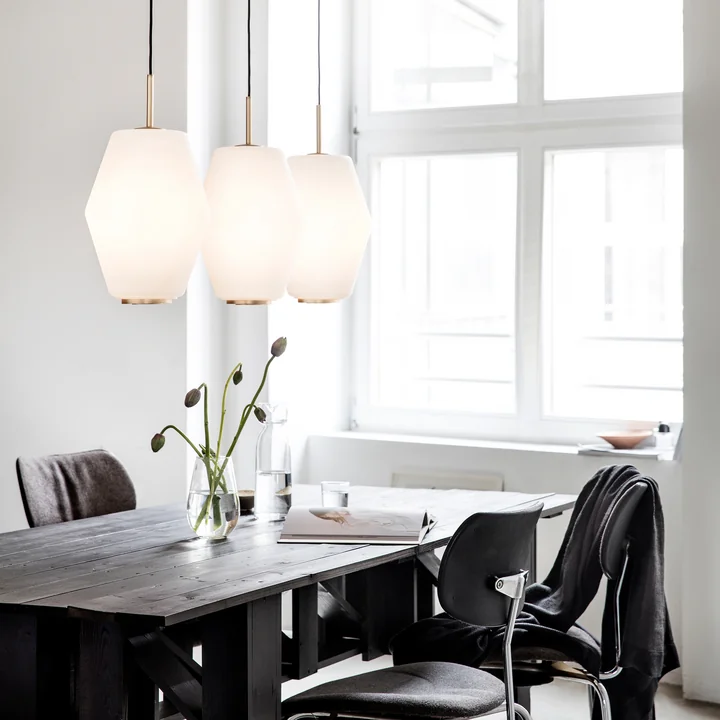 The Northern Lighting - Dahl pendant luminaire placed in row above the dining table