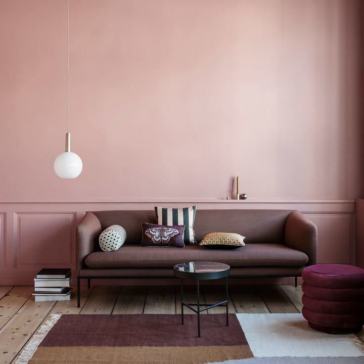 The ferm living - Opal Lampshade, Decorative Sphere next to the Sofa.