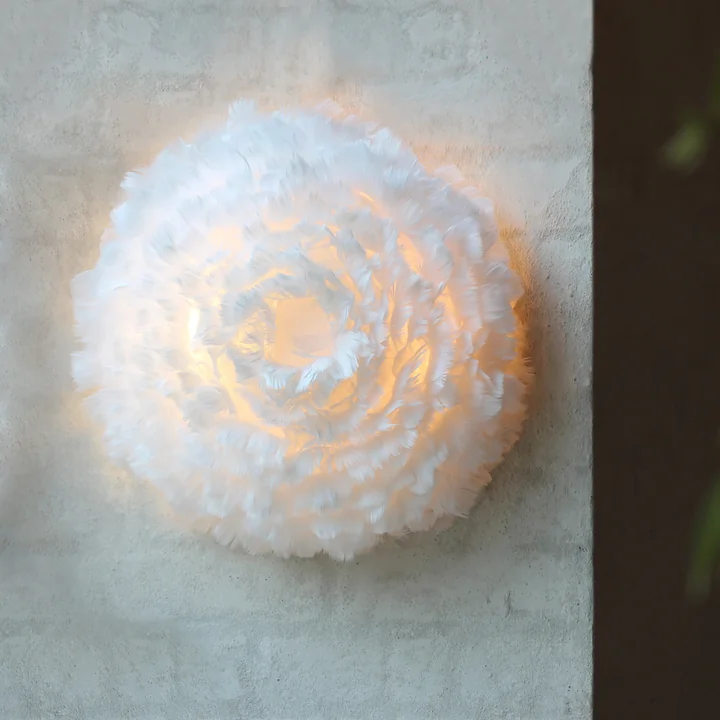 Eos Up Ceiling and wall lamp from Umage in Créme on the wall