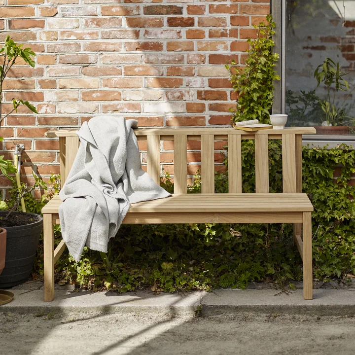 The Skagerak - Plank Bench 144 cm, Teak in the Garden