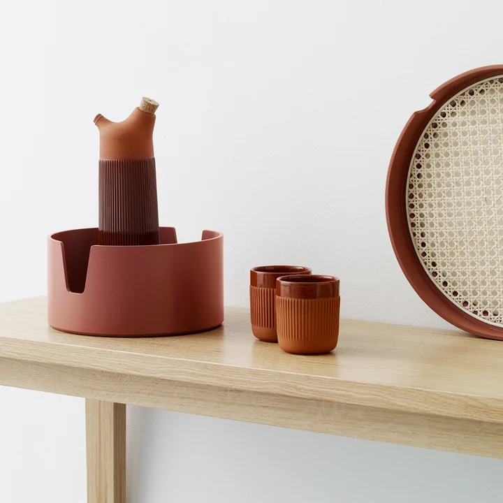 The Normann Copenhagen - Salon Tray in Russet, the Junto Cup and the Carafe in Terracotta