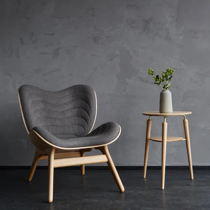 My Spot side table and A Conversation Piece Armchair from Umage