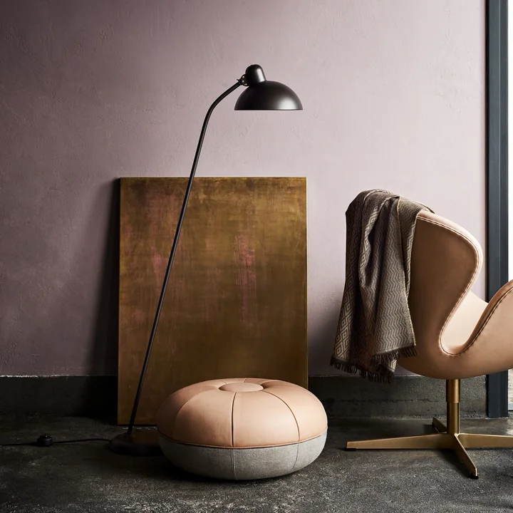 The Fritz Hansen - KAISER idell - floor lamp, the Swan armchair and the Cecilie pouf