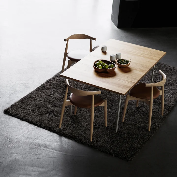 The Carl Hansen - CH20 Elbow Chair with CH322 Table